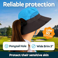 Girl in blue and black GearTOP sun hat for kids with ponytail hole, wide 3-inch brim, and UPF 50+ UV protection.