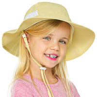 Child modeling the beige GearTOP kids bucket sun hat featuring UPF 50+ protection, lightweight breathable mesh, and a secure adjustable chin cord for all-day comfort.