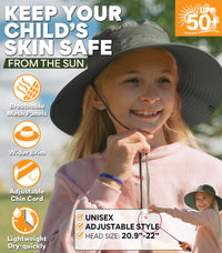Girl adjusts olive GearTOP kids sun hat outdoors; UPF 50+, mesh panels, wide brim, adjustable chin cord, lightweight.