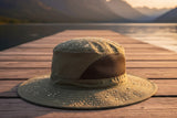 Ventilated wide-brim UPF sun hat in bright outdoor heat
