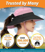 Woman wearing GearTOP Navigator pink and black sun hat with ponytail hole and UPF 50+ protection, perfect for outdoor activities.
