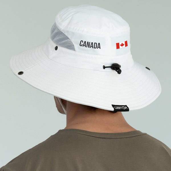 Angled rear view of the white GearTop Navigator Series Canada Edition wide brim sun hat with breathable mesh panels, adjustable fit, and UPF 50+ sun protection for outdoor adventures.