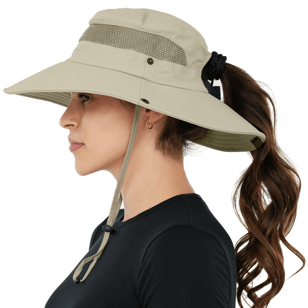 Side view of woman in beige GearTOP sun protection hat with mesh panels and ponytail hole, ideal for gardening, travel, or summer.