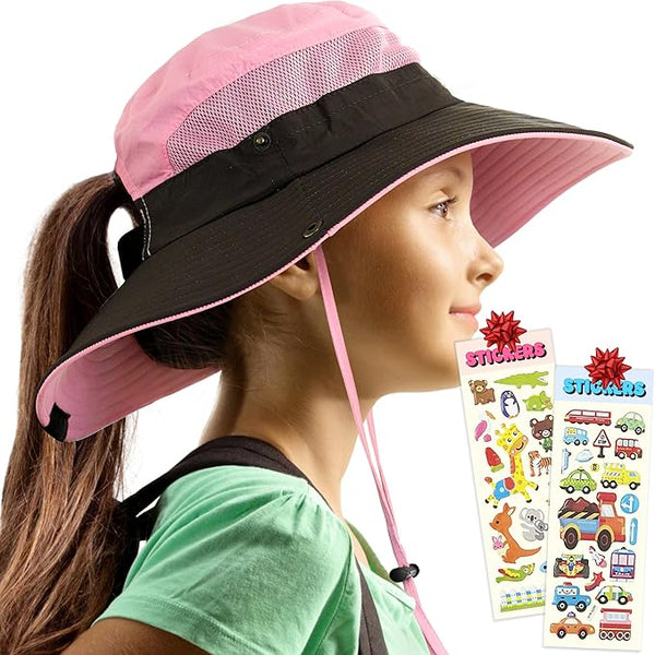Side view of girl in pink GearTOP ponytail sun hat for kids, mesh design, with two sticker sheets for girls.