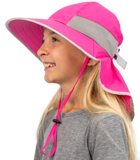 Girl wearing pink kids sun hat with wide brim and neck flap for UV protection outdoors