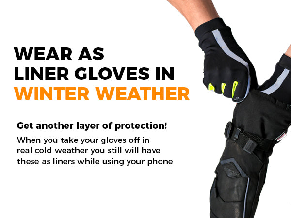 GearTop touchscreen reflective gloves worn as lightweight glove liners for extra warmth and touchscreen access beneath insulated winter gloves in freezing conditions.