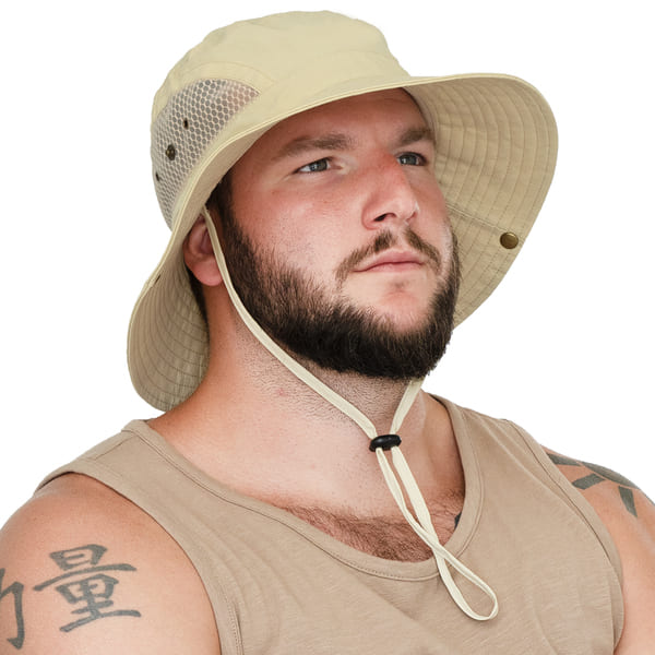 Man wearing the GearTOP Floater Series beige waterproof wide brim bucket hat with breathable mesh ventilation, adjustable chin strap, and UPF 50+ sun protection for outdoor adventures.